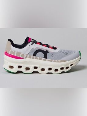 On Running Black and White Running Sneaker with Red Accents